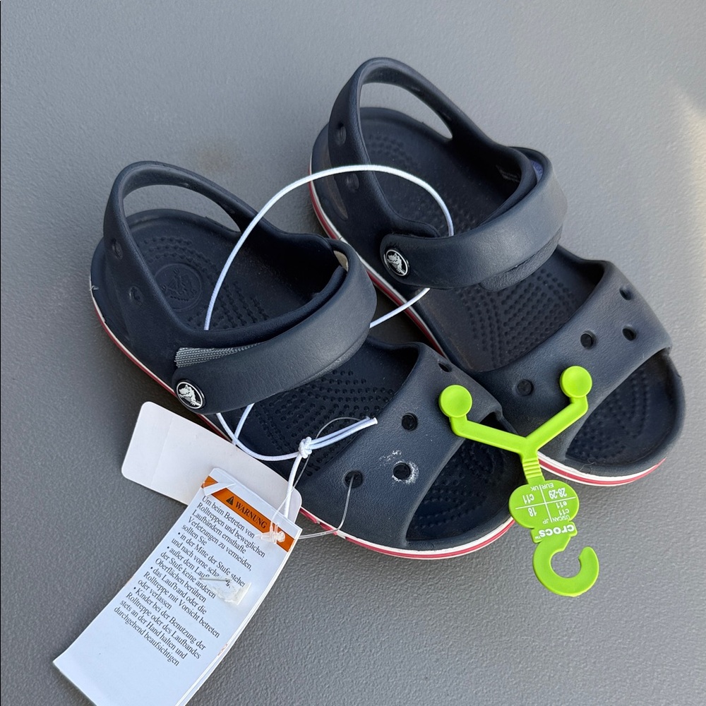 11 blue, gender, neutral size 11 CROCS brand new but dirty on the bottom